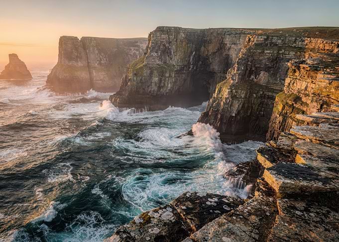 Dramatic Coastal Cliffs at Sunset