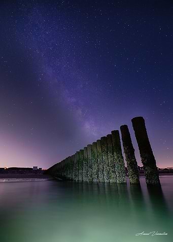 Milky Way Over Coastal Wooden Piles