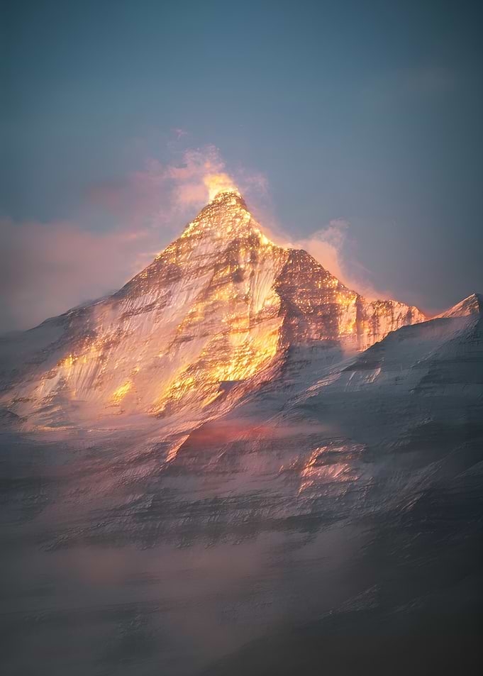 Golden Sunset on Snowy Mountain Peak