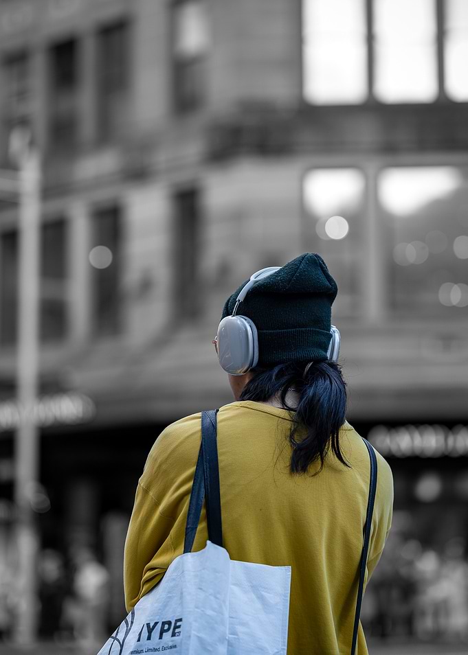 Person Wearing Headphones and Beanie