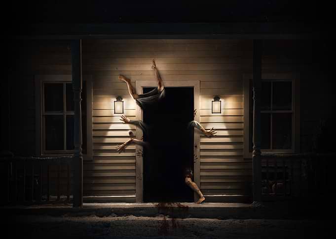 Horror Scene at House Doorway