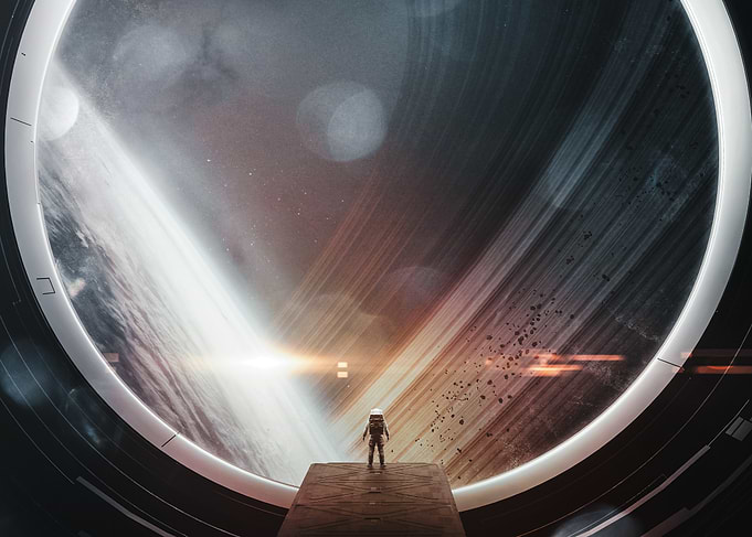 Astronaut Looking at Ringed Planet