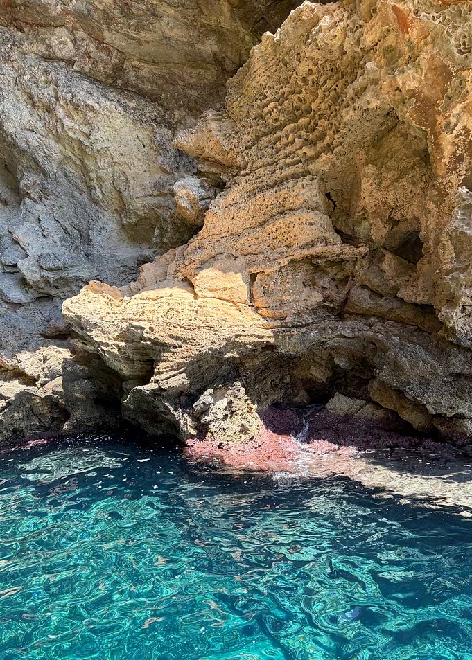 Rocky Coastal Cliff and Turquoise Water
