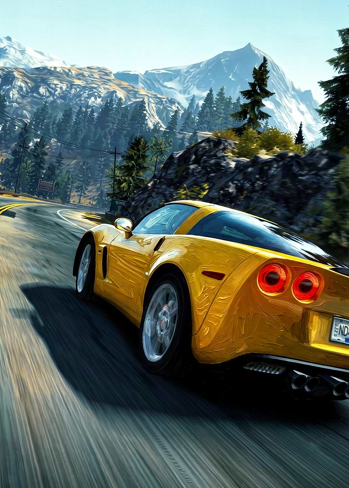 Yellow Corvette Driving Through Mountains
