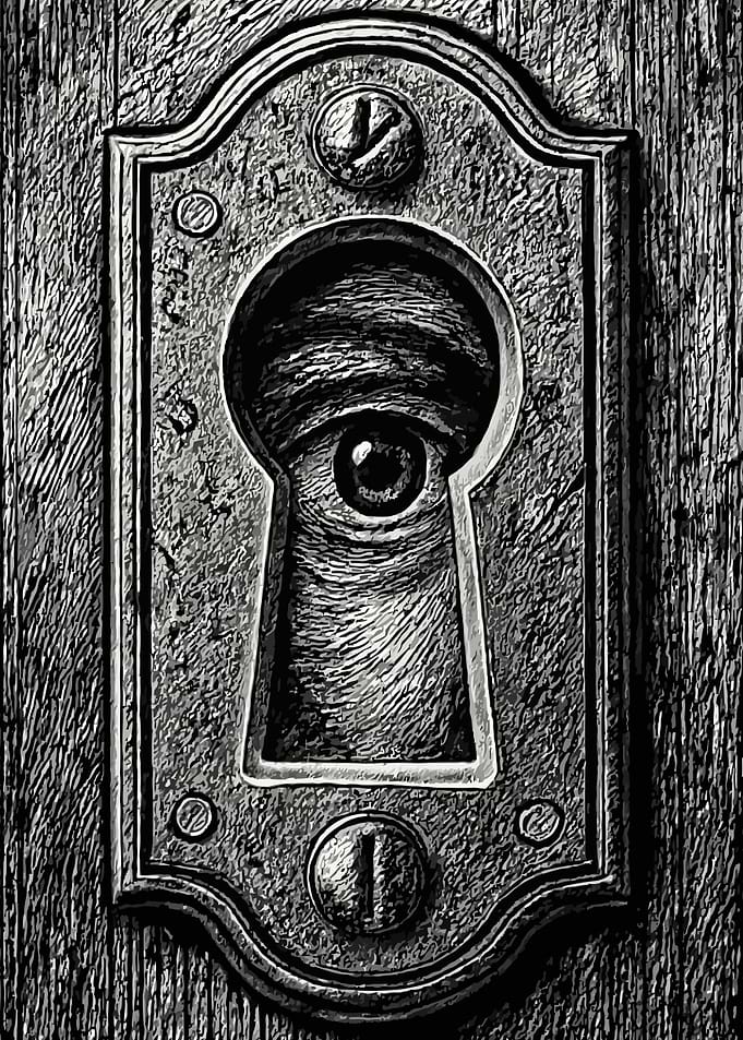 Eye Peering Through Keyhole