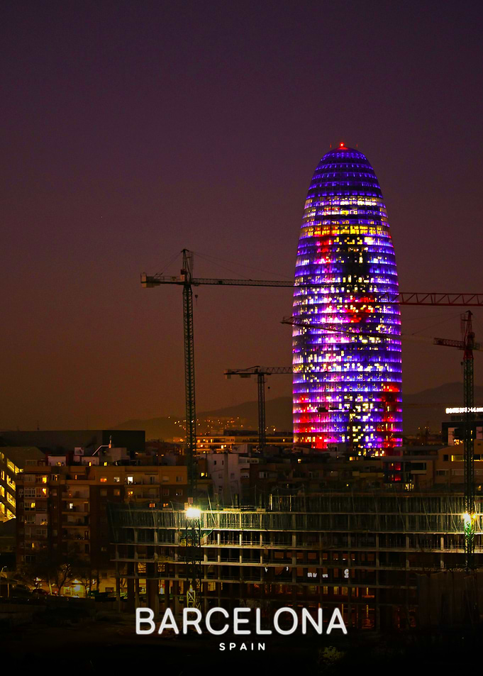 Torre Glòries illuminated in Barcelona