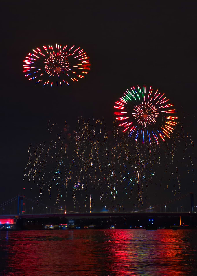 Fireworks Over a Bridge at Night