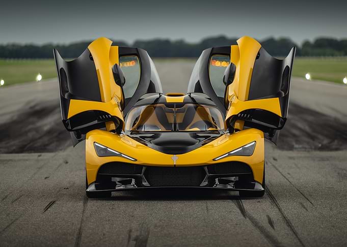 Yellow and Black Supercar with Doors Open