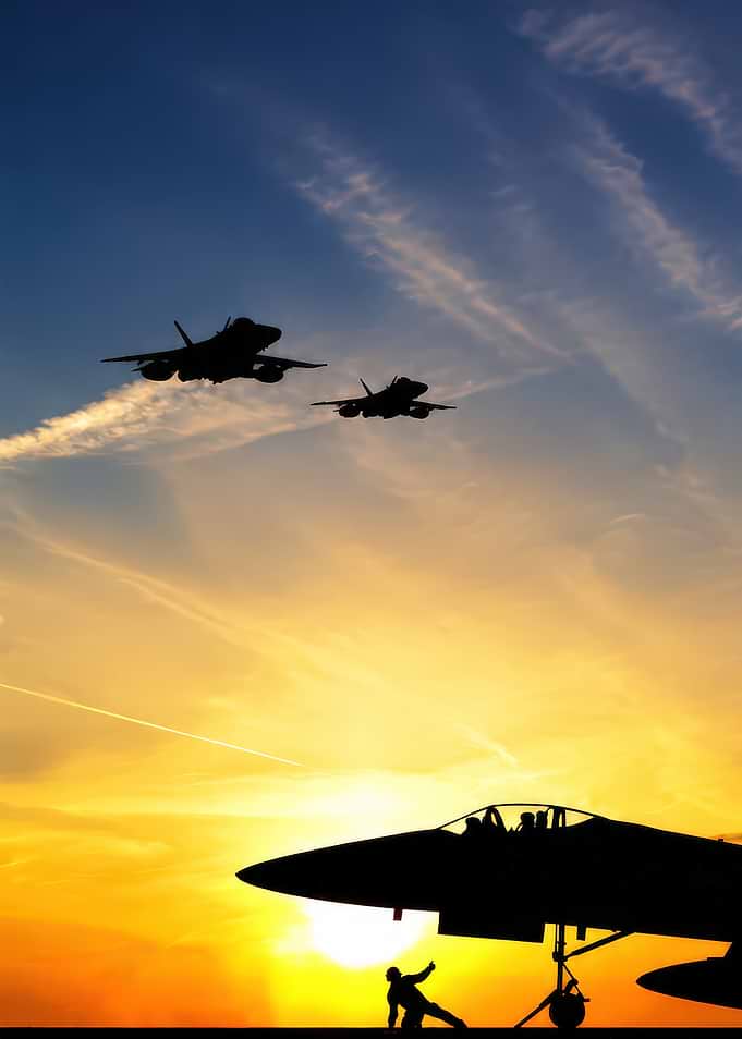 Military Jet Silhouette at Sunset
