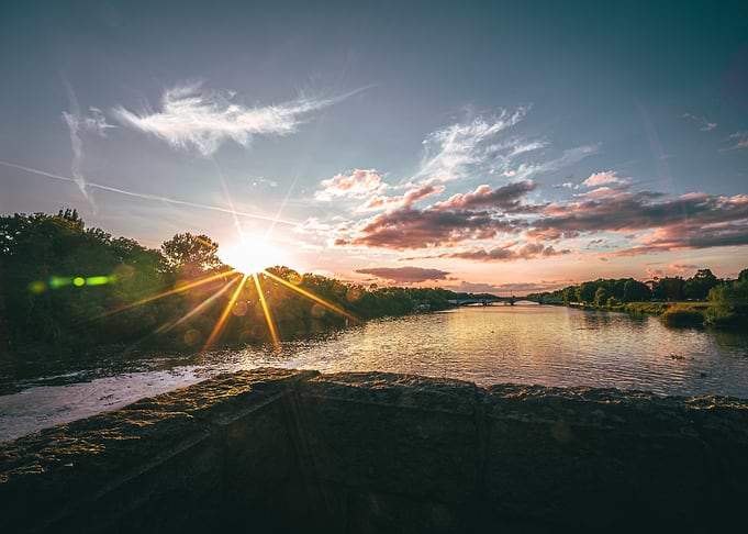 Golden Sunset Over River Landscape