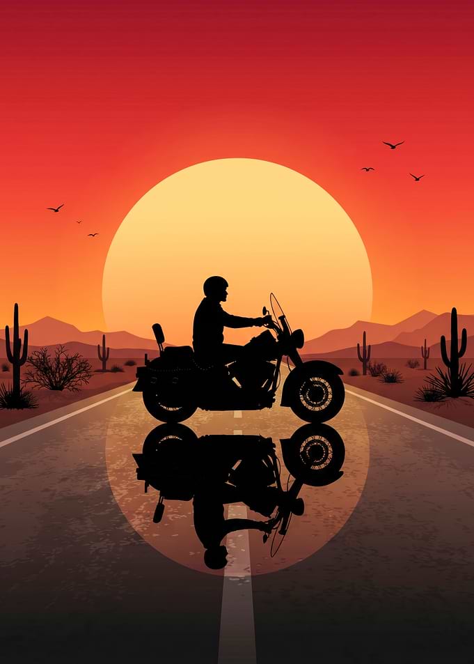 Motorcyclist Riding Into Desert Sunset