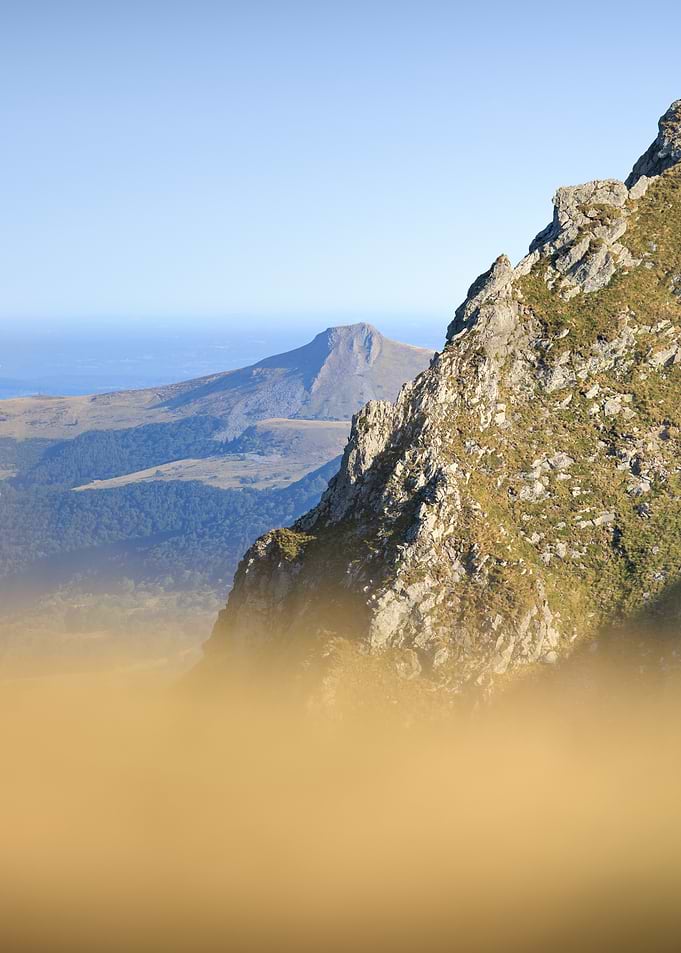 Sancy, Auvergne - Rugged Mountain Peak Above Golden Mist