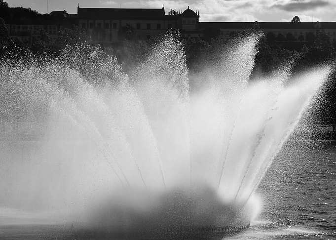 Black and White Fountain Spray on Mondego River, Coimbra.