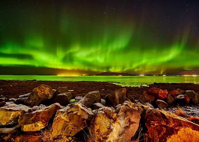 Vibrant Aurora Borealis Over Reykjavik