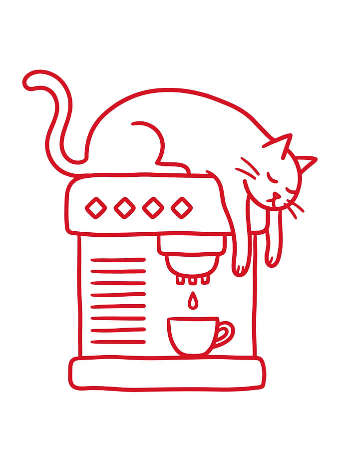 Sleeping Cat on Coffee Machine