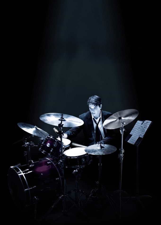 Drummer in a Spotlight whiplash