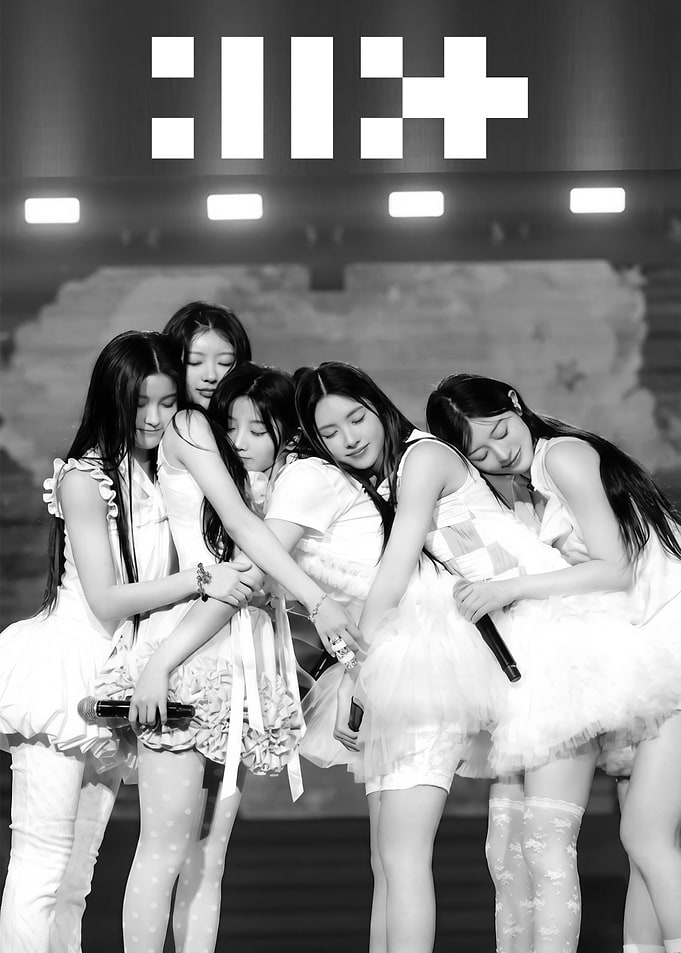 ILLIT members in a group hug