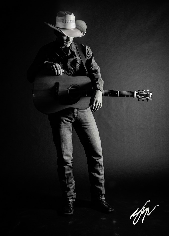Cowboy Musician with Acoustic Guitar