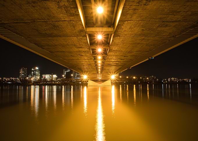 Golden Night Bridge Reflections
