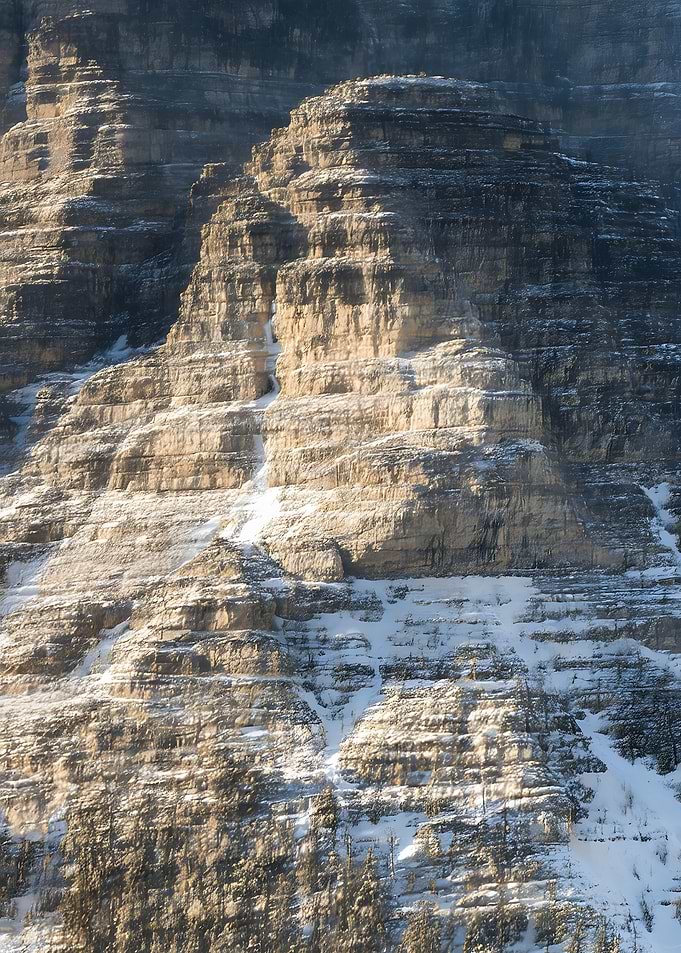 Rugged Snow-Covered Mountain Cliff Face