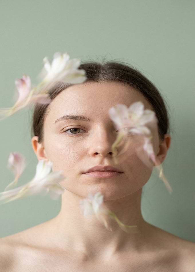 Portrait of Woman with Floating Flowers