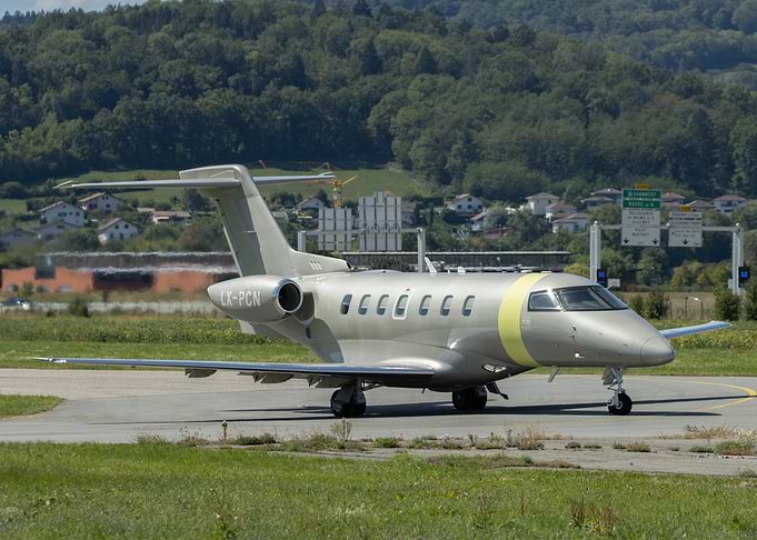 Silver Private Jet on Tarmac