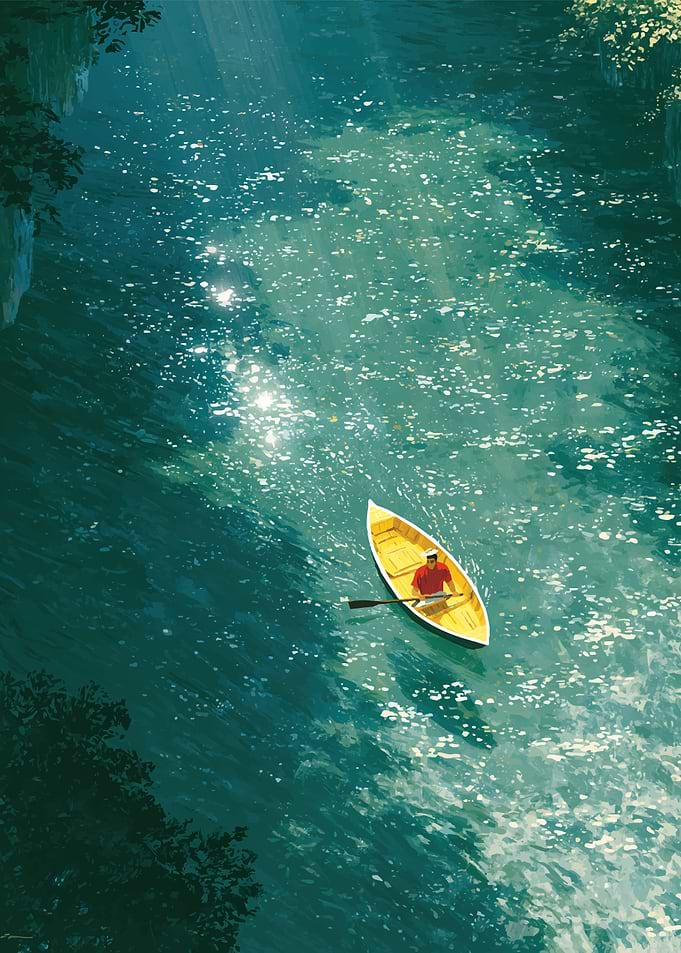 Person rowing yellow boat on river