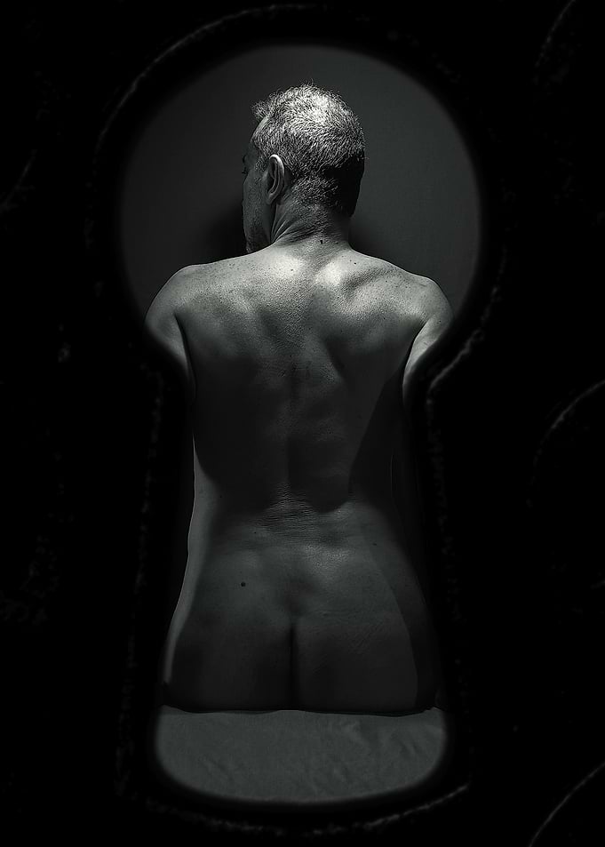 Man Viewed Through a Keyhole