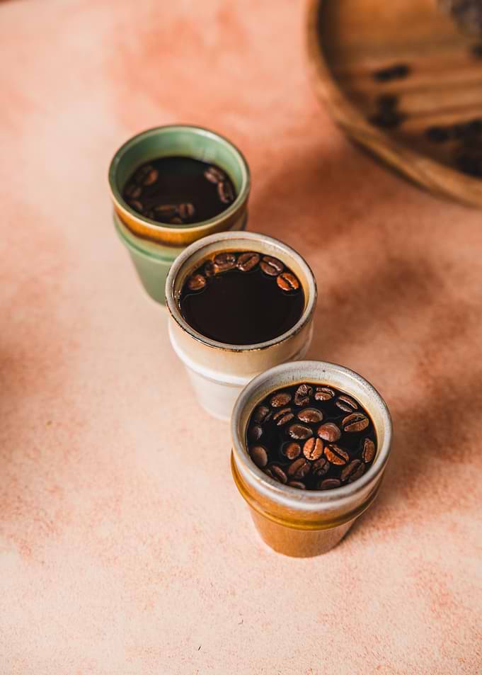 Three Cups of Coffee with Beans