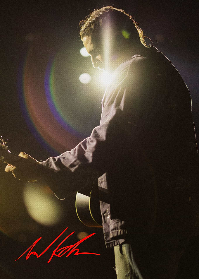 Musician Performing with Acoustic Guitar