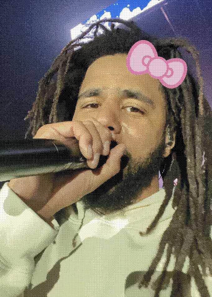 J. Cole with Hello Kitty Bow
