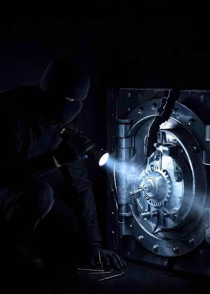 Burglar Cracking a Heavy Vault