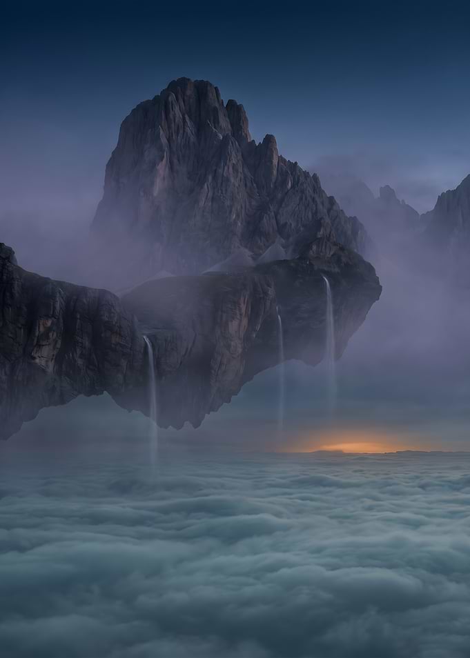 Floating Mountain Peaks Above Clouds