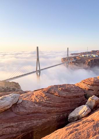 Suspension Bridge Over Cloud Chasm