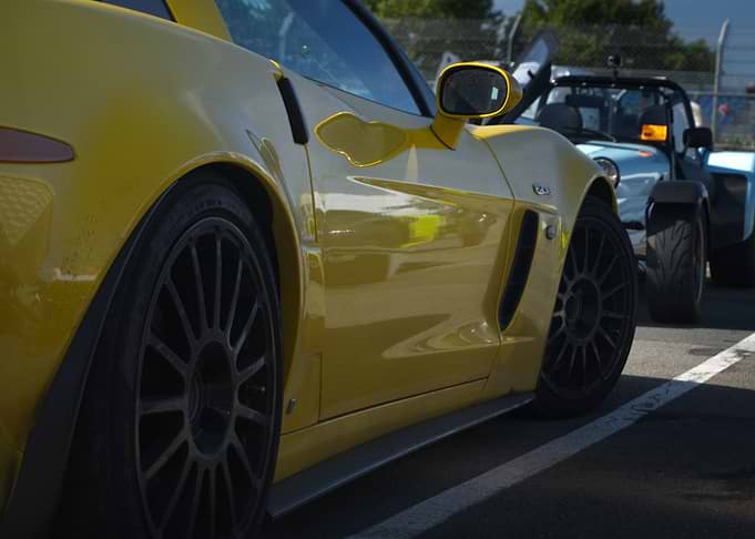 Yellow Corvette Z06 at Racetrack