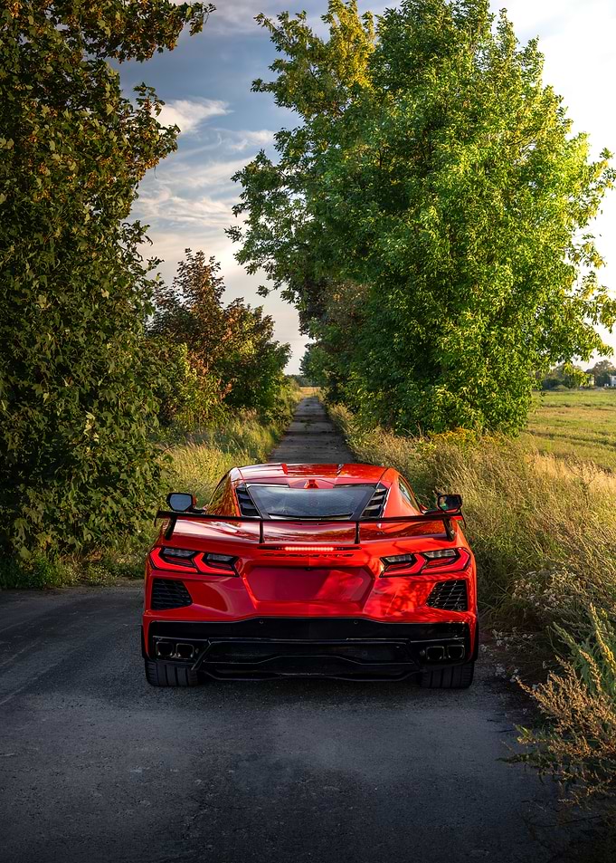 Red Corvette C8 on Country Road