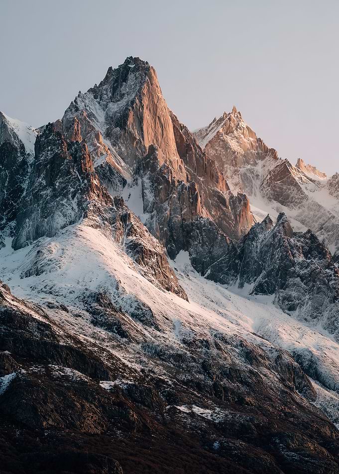 Snow-Capped Mountain Peaks at Sunrise | Majestic Alpine Mountains