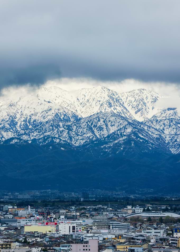 Snow-Covered Tateyama Mountains — Blue Winter Landscape Above Toyama, Japan