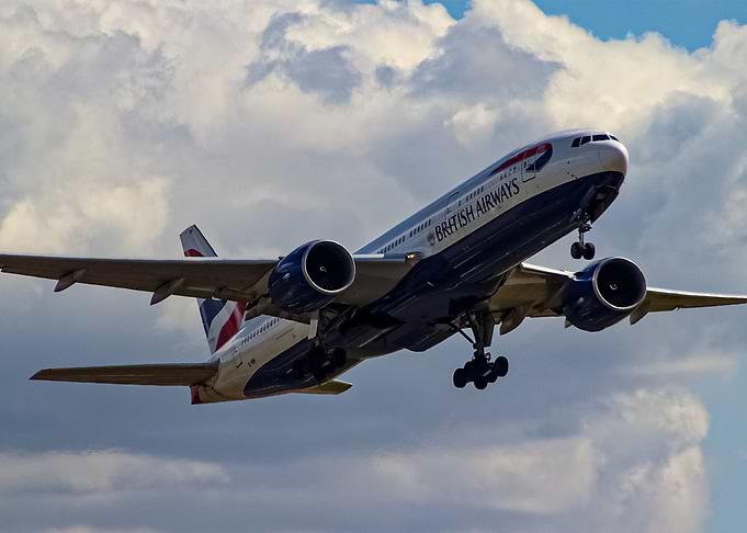 BA 777-236 taking off from Heathrow RWY 27R Reg: G-VIIM