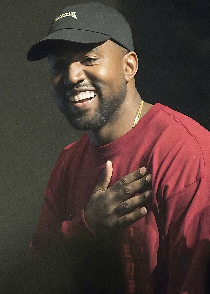 Kanye West Smiling in Red Shirt