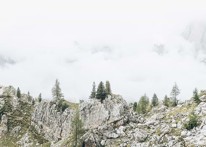 Dolomites, Italy | Mountain skyline in the clouds at Cinque Torri between rocks and wild alpine nature