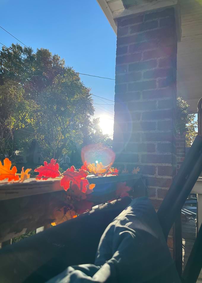 Autumn Sunlight on a Porch Railing