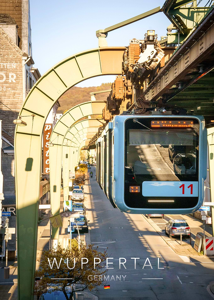 Wuppertal Suspension Railway over a straight Road in Germany