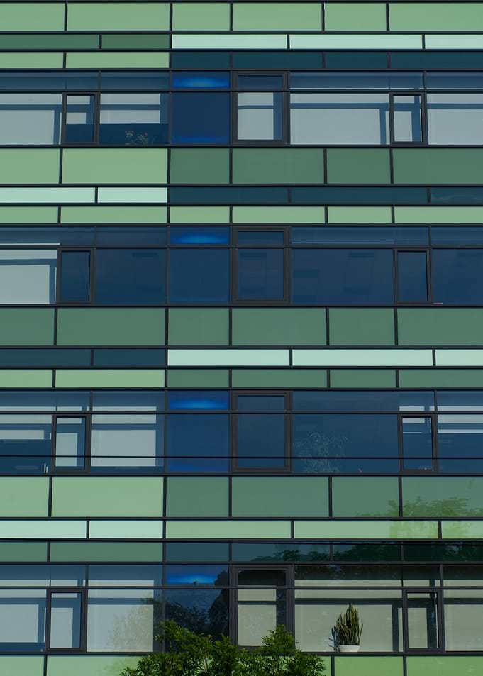 Modern Green Glass Office Building Facade