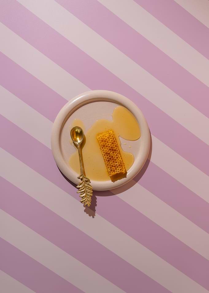 Honeycomb and Gold Spoon on Plate