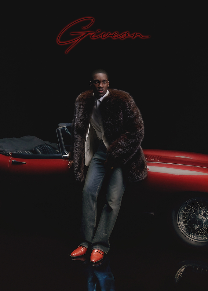 Giveon Posing with Vintage Red Car