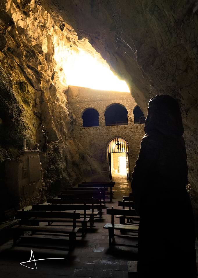 Silhouette in a Cave Chapel