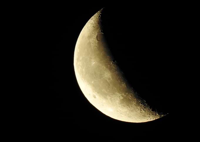 Crescent Moon in Night Sky