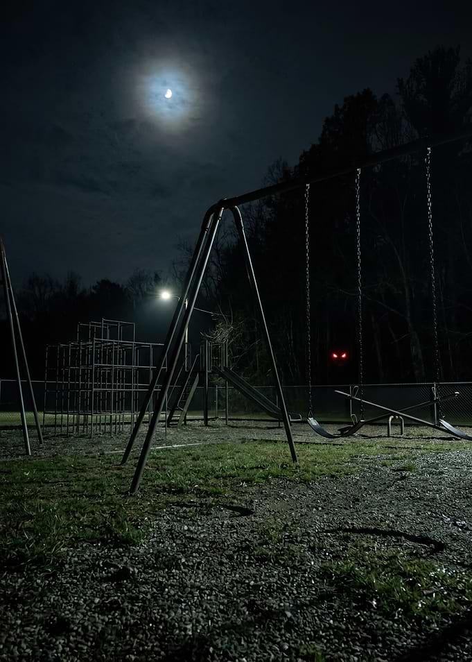 Eerie Playground at Night