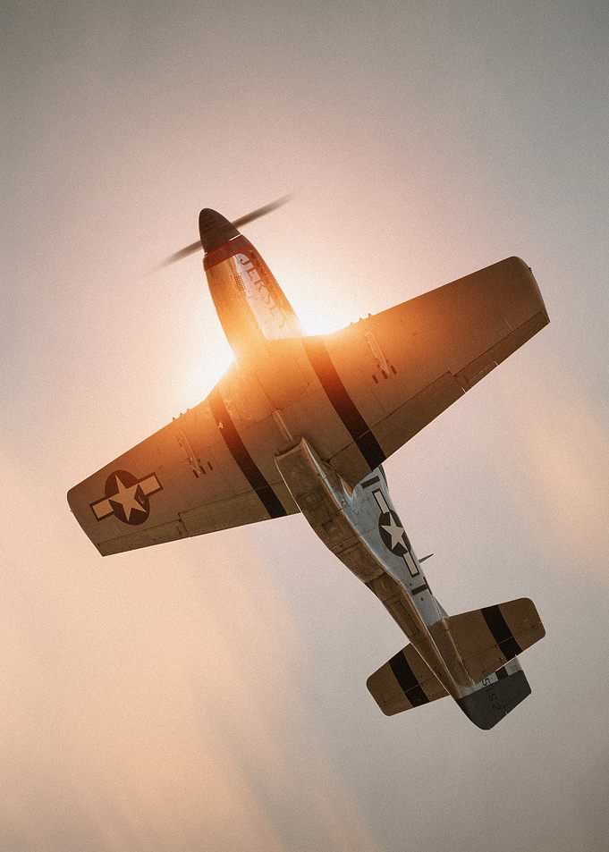 P-51 Mustang Flying Into Sunset